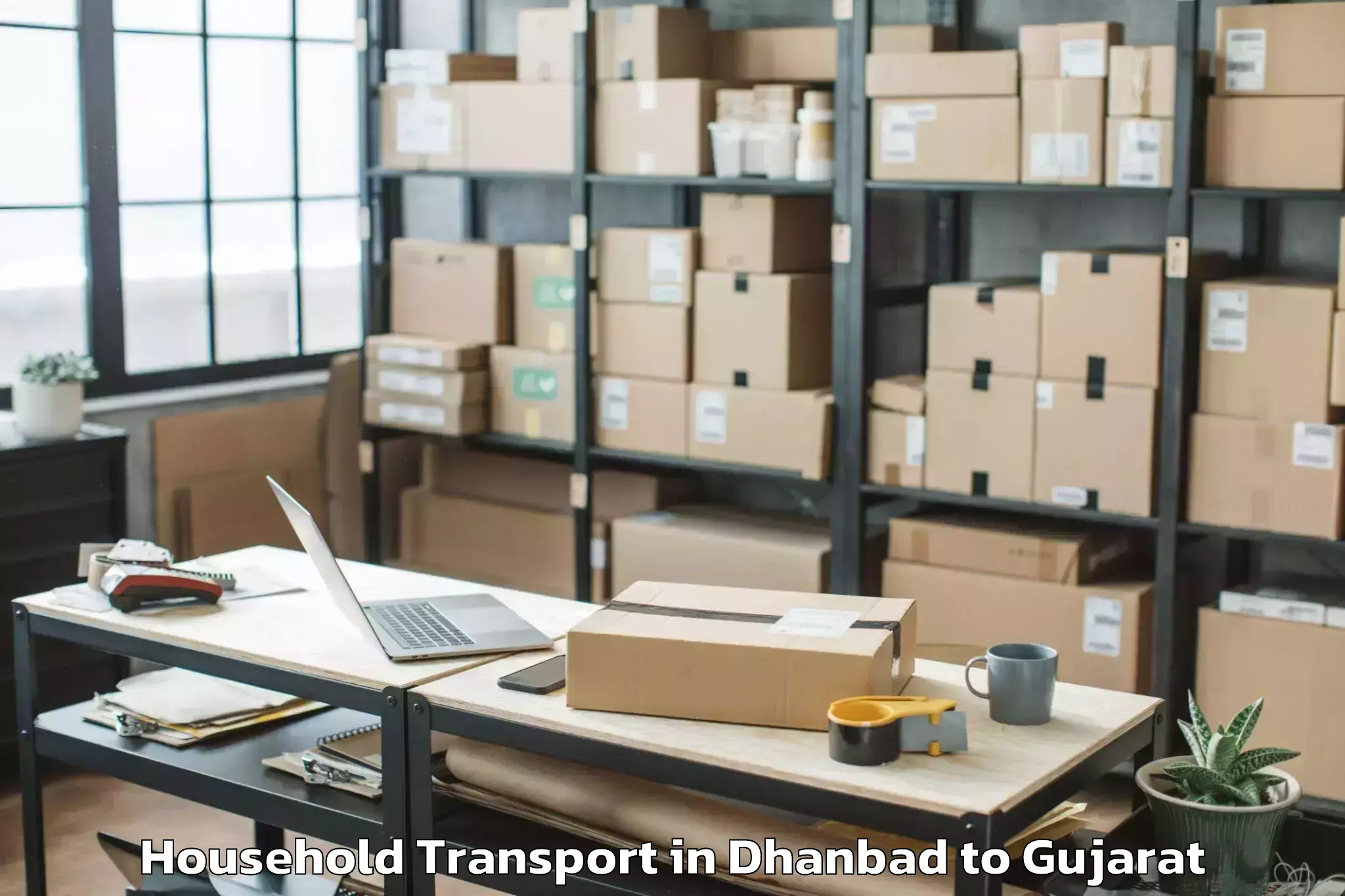 Top Dhanbad to Dhuvaran Household Transport Available